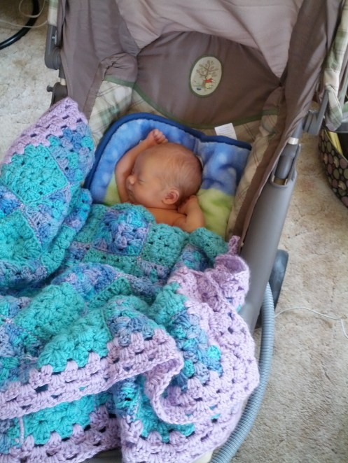 Little L and her blanket made with love!