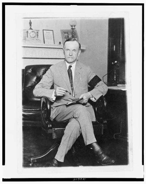 President Calvin Coolidge wearing an armband in mourning for President Harding. Photo found at americanhistory.unomaha.edu