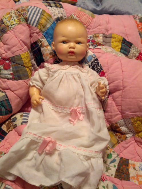 My precious Bye-Lo Baby surrounded by an almost 70 year old quilt made by my Mama.