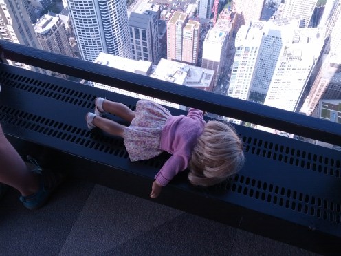 The workers at Chicago 360 chuckled at our antics. Poor Kit passed out from the height.