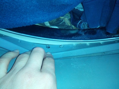 I do not advise cleaning your washer with clothes inside it. But it is a snow day in Minnesota and we are getting lots done around here! These are the offensive holes.